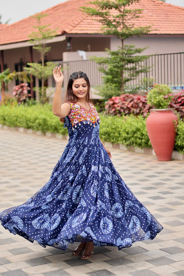Celebrate The Spirit Of Navratri In This Vibrant Faux Georgette Gamthi Work Gowns
